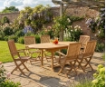 Brompton Extendable Teak Table and 6 Rimini Folding Armchairs Set