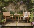Round Teak Occasional Table and Amalfi Lounge Armchairs
