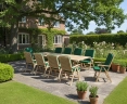 Dorchester Extending 2 - 3m Table & 10 Cheltenham Recliner Chairs