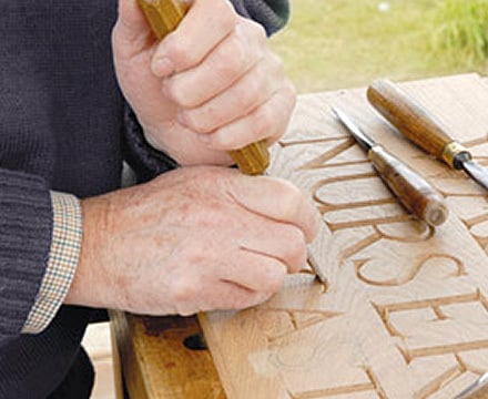 Carved Inscription in Teak